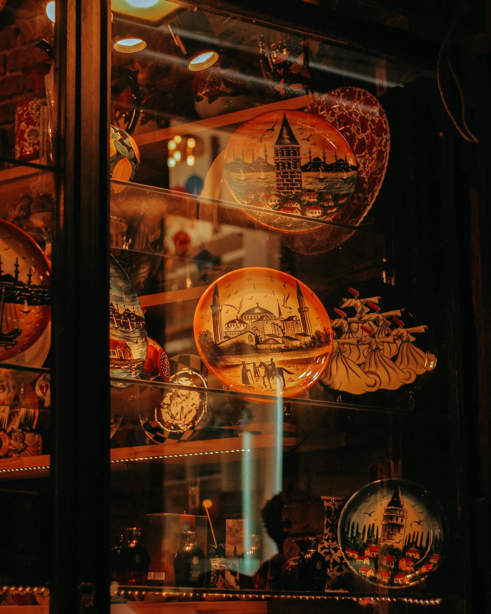 Showcasing beautiful vintage Turkish ceramics in an antique cabinet in Istanbul, Turkey.