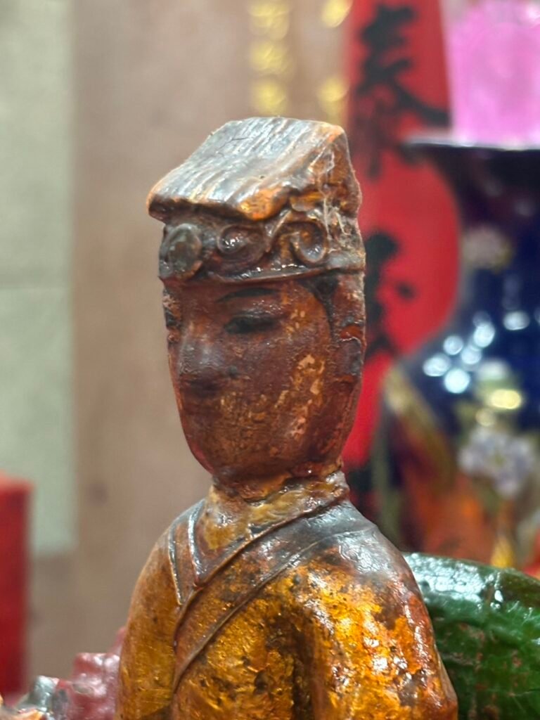 Profile detail of the scholar cap and face